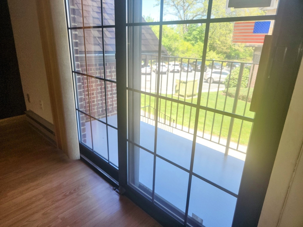 1003 North Main Street, Unit 7 Randolph, MA 02368 - Photo 10 of 31 a view of an entryway with wooden floor