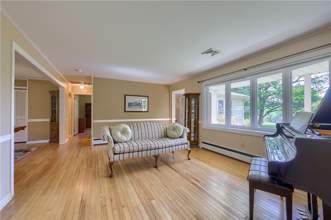 Coldsprings Rd Union Pottstown, PA 19465 - Photo 42 of 71 Hardwood floors and generous natural light create an inviting atmosphere in this living area.