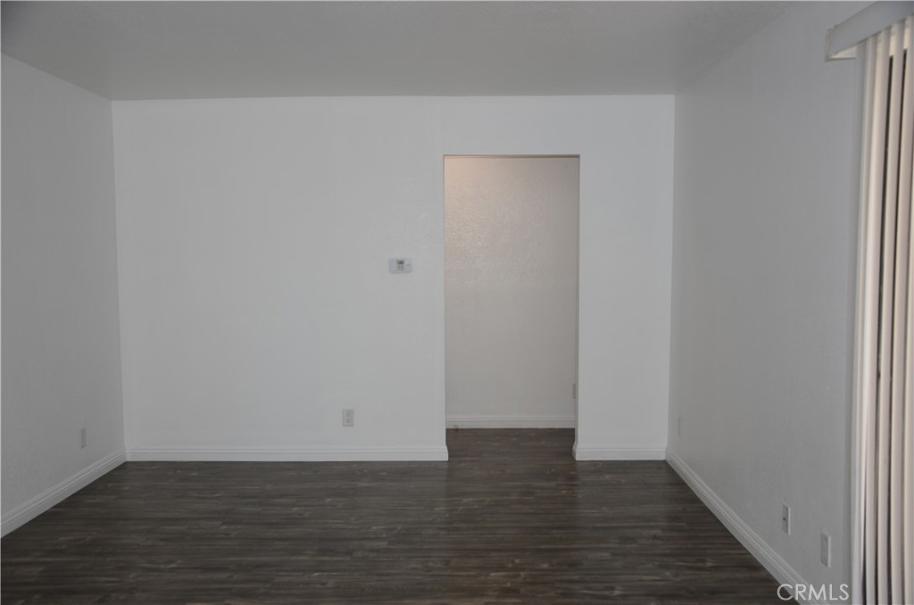 43600 Santa Rosa Circle Lancaster, CA 93535 - Photo 24 of 25 a view of an empty room with wooden floor
