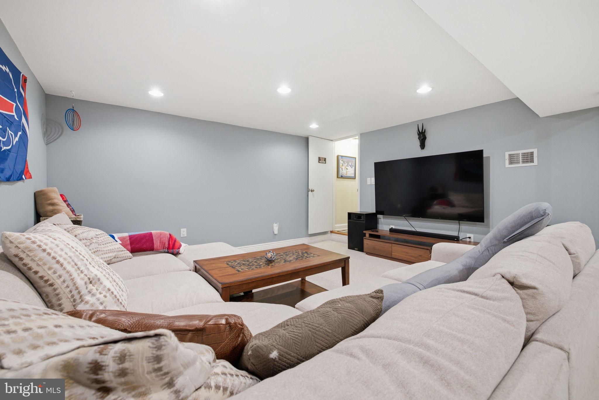 11937 Bayswater Road Gaithersburg, MD 20878 - Photo 30 of 55 Cozy basement retreat for relaxation.