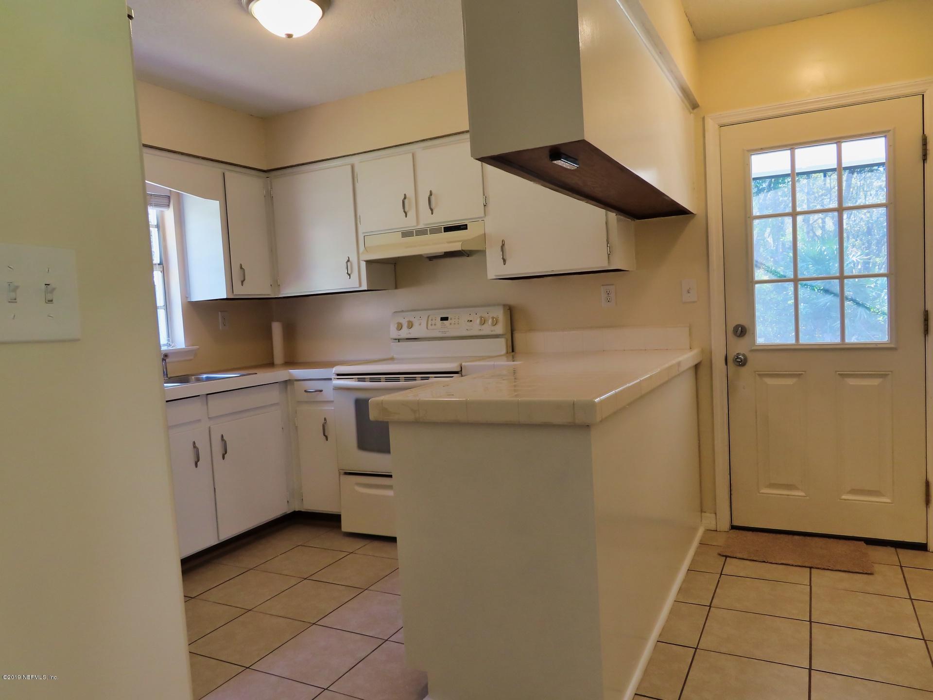 128 Hoover Road Palatka, FL 32177 - Photo 28 of 55 Tile floors in kitchen and entry way...
