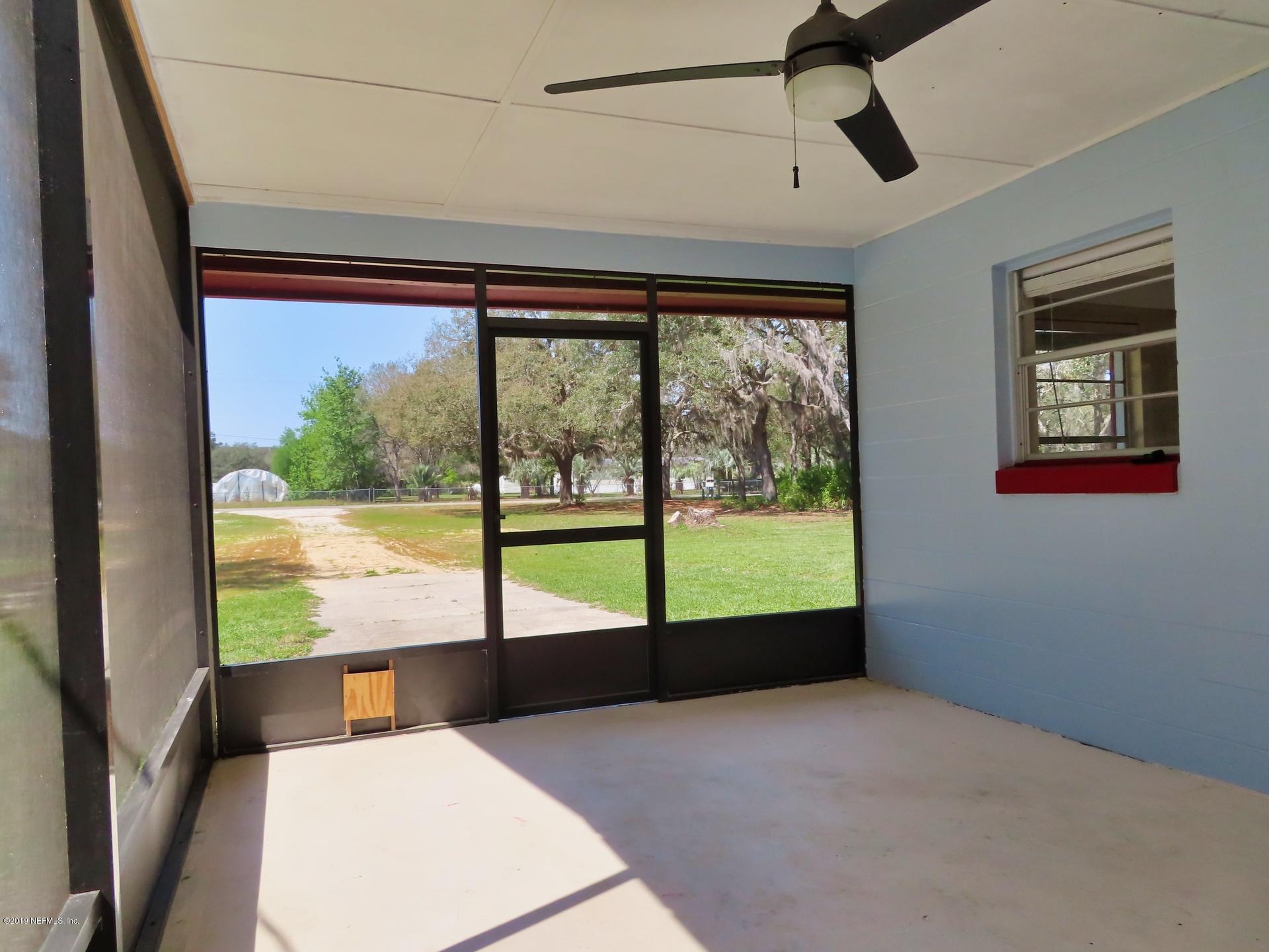 128 Hoover Road Palatka, FL 32177 - Photo 30 of 55 Fully screened patio. No bugs...