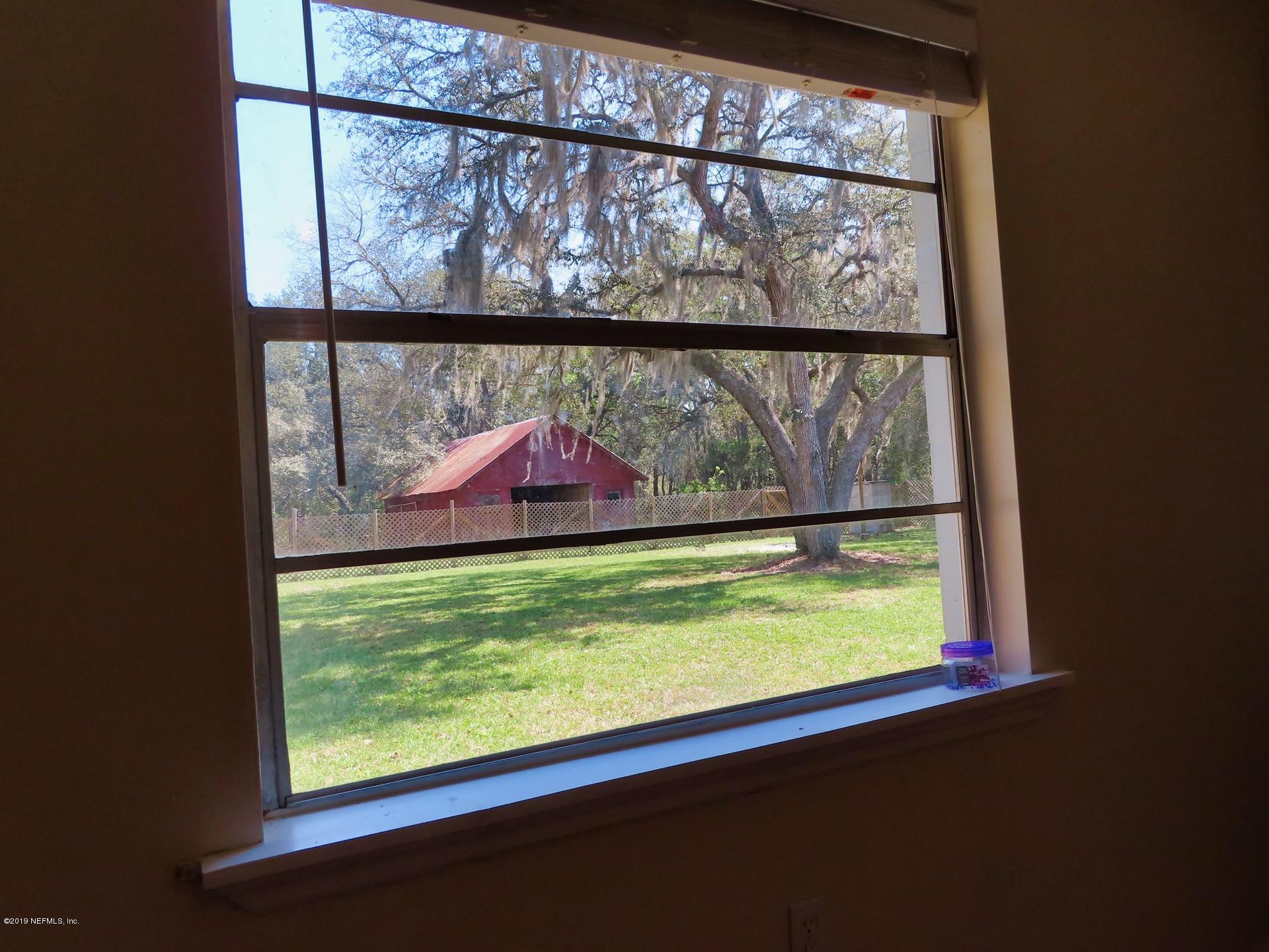 128 Hoover Road Palatka, FL 32177 - Photo 54 of 55 Great view of backyard from master...