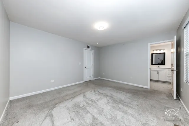 a view of a kitchen with a sink