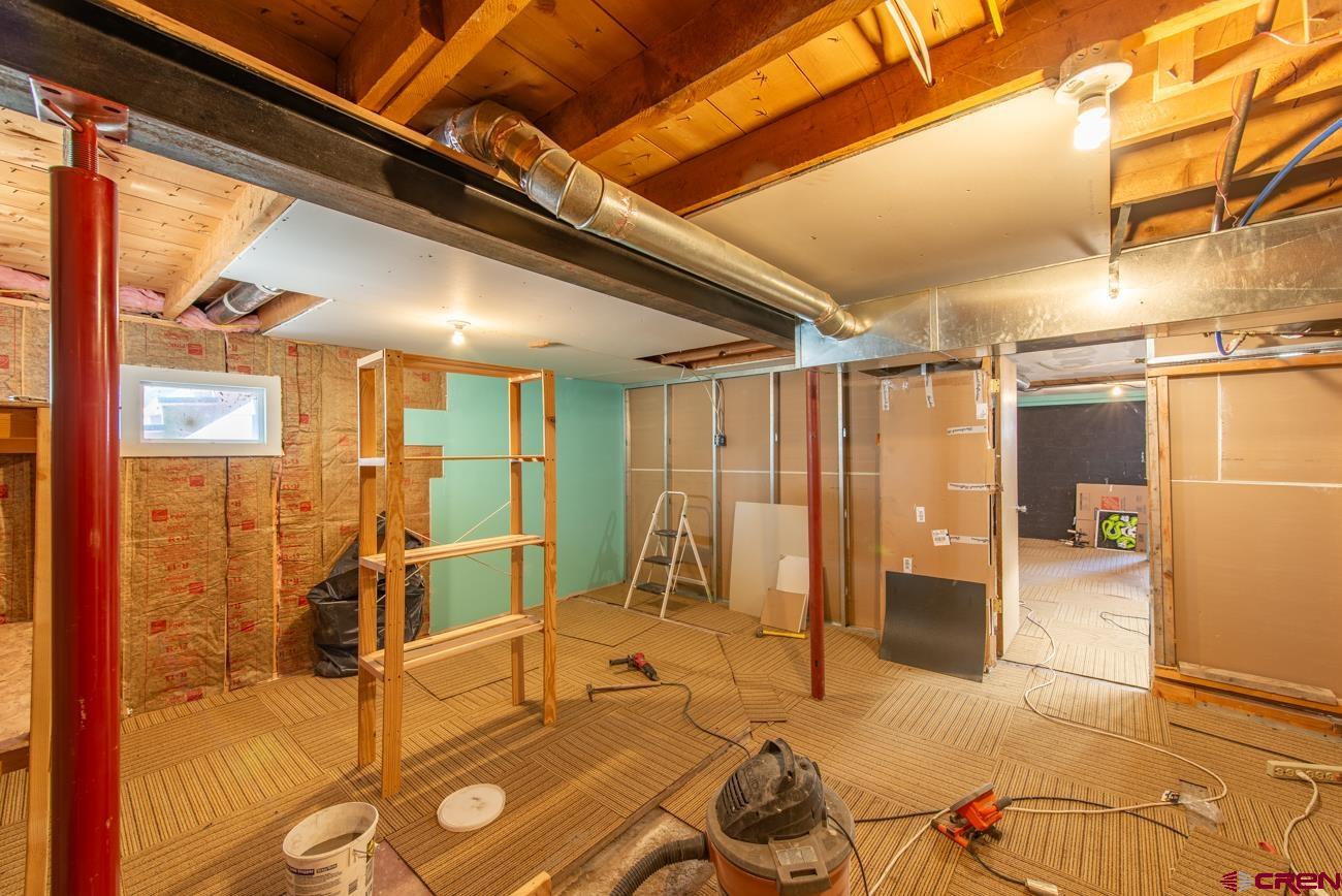 16322 Chipeta Road Montrose, CO 81403 - Photo 35 of 42 a view of a patio with table and chairs
