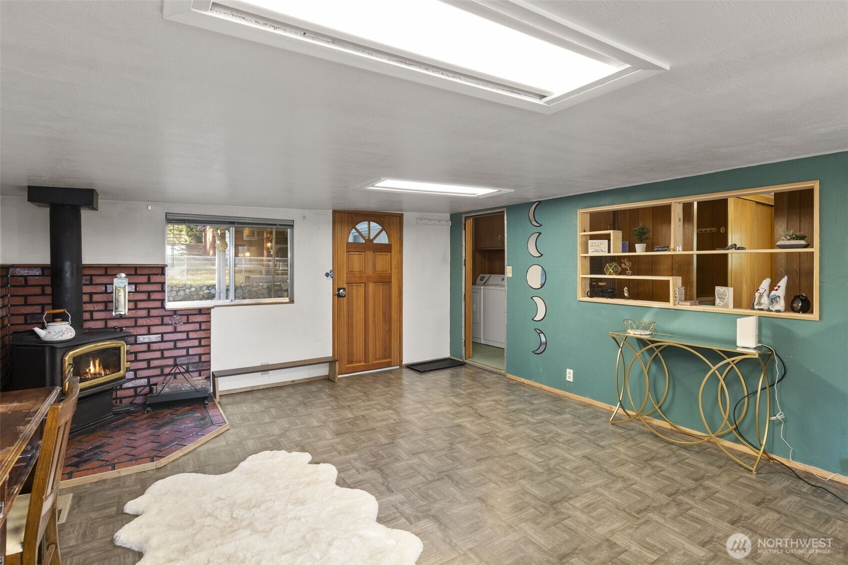 8491 Illahee Road Northeast Bremerton, WA 98311 - Photo 15 of 36 an empty room with furniture and windows