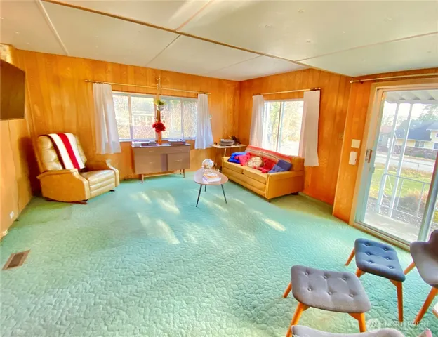 a room with furniture and window