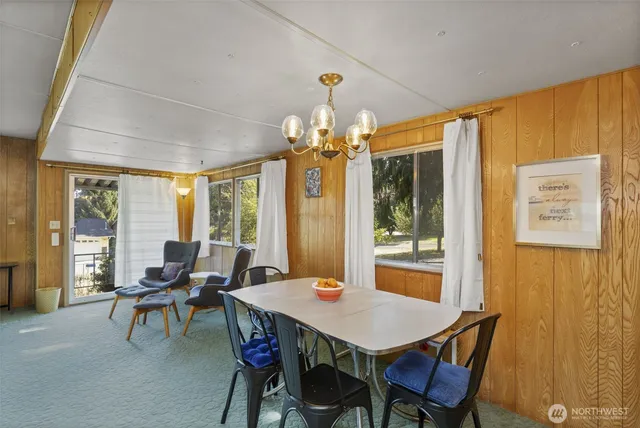 a bathroom with a sink mirror and a shower
