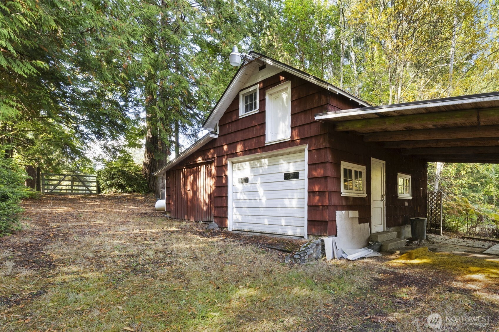 8491 Illahee Road Northeast Bremerton, WA 98311 - Photo 5 of 36 a view of a house with a yard