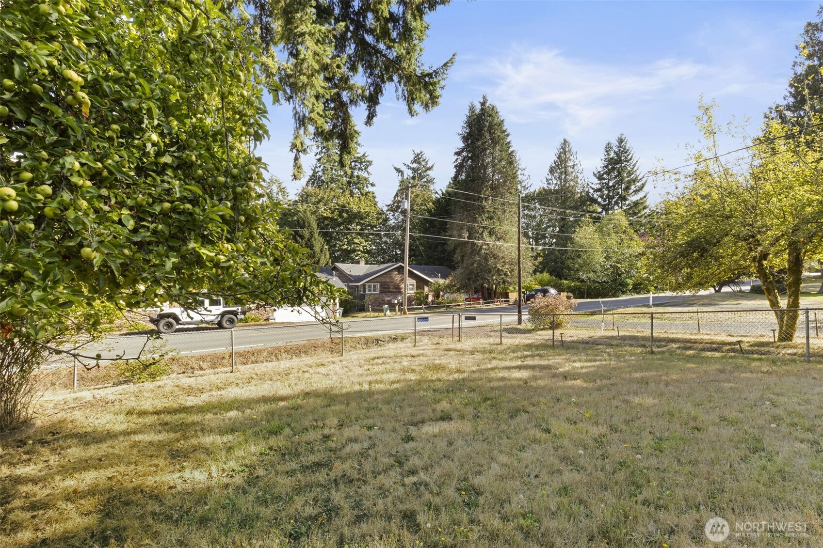 8491 Illahee Road Northeast Bremerton, WA 98311 - Photo 9 of 36 a view of a house with a yard