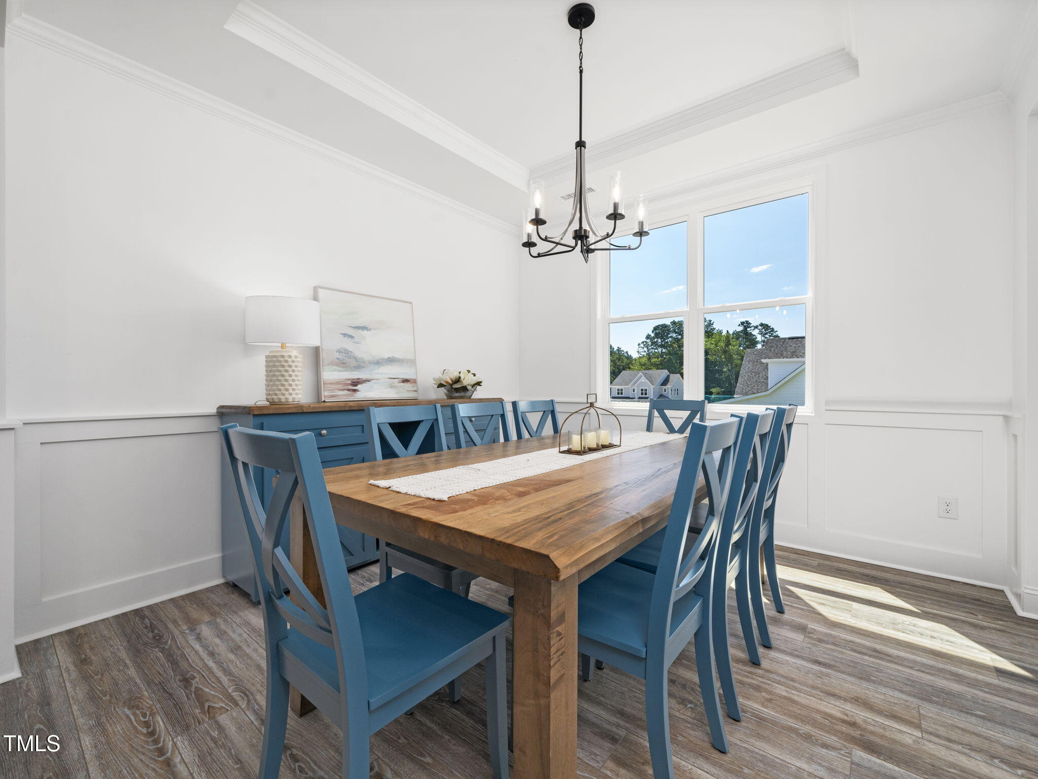 1112 Prominence Drive Durham, NC 27712 - Photo 15 of 40 a view of a dining room with a table and chairs