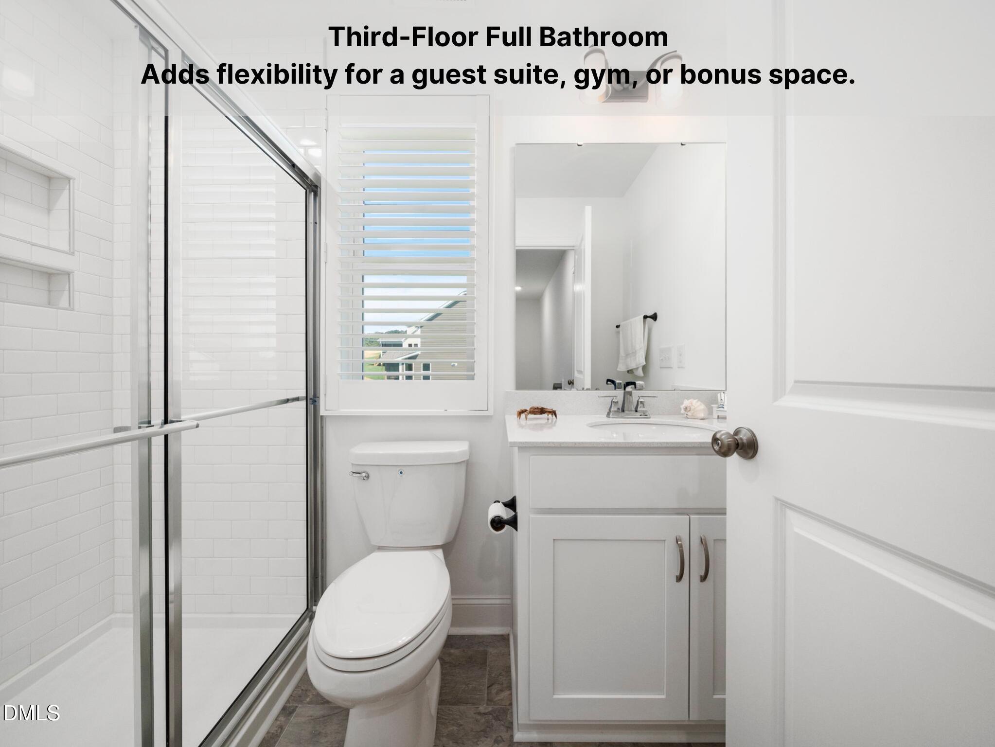 1112 Prominence Drive Durham, NC 27712 - Photo 28 of 40 a bathroom with a sink a toilet and a mirror