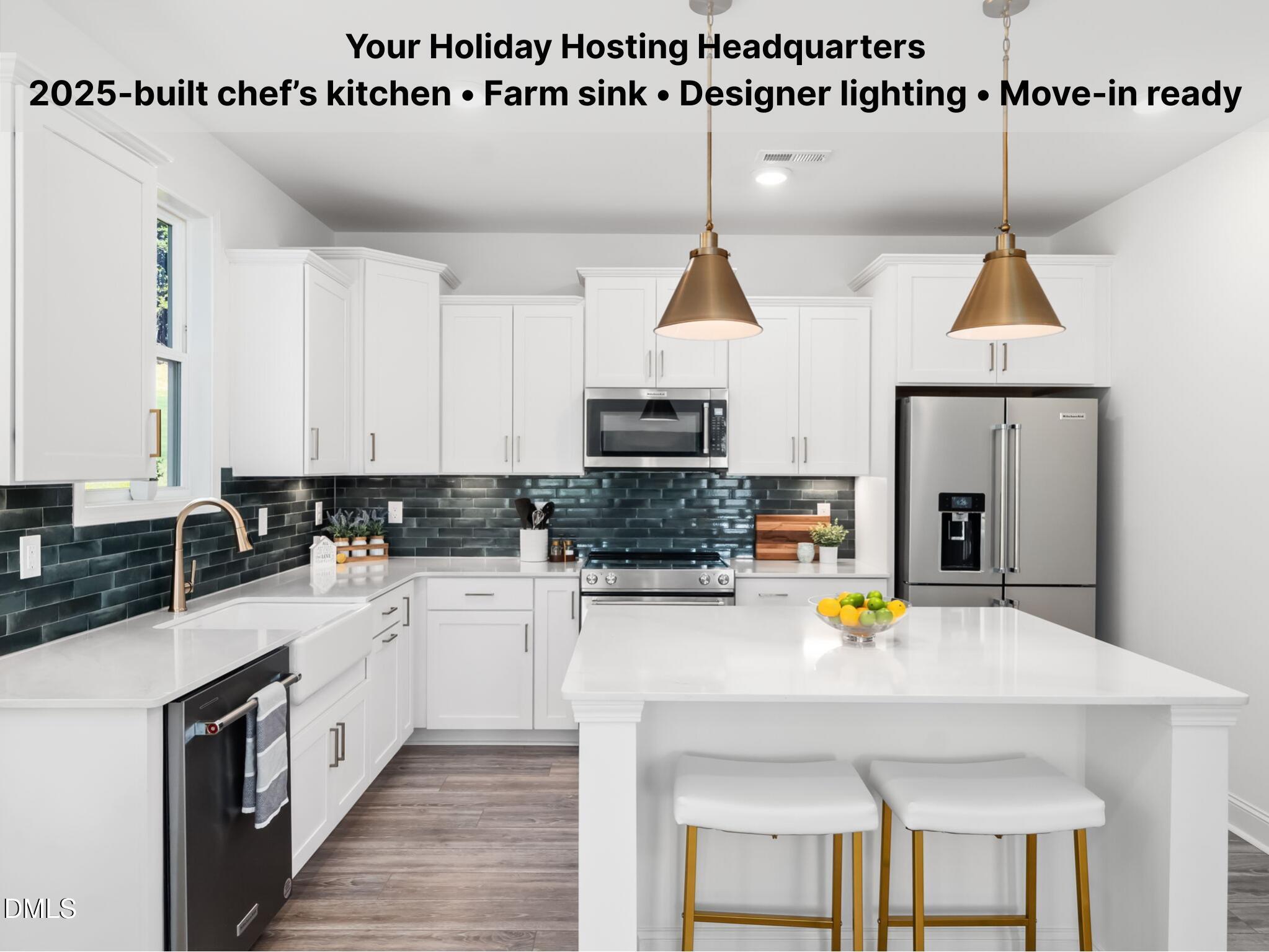 1112 Prominence Drive Durham, NC 27712 - Photo 3 of 40 a kitchen with a sink stainless steel appliances and white cabinets