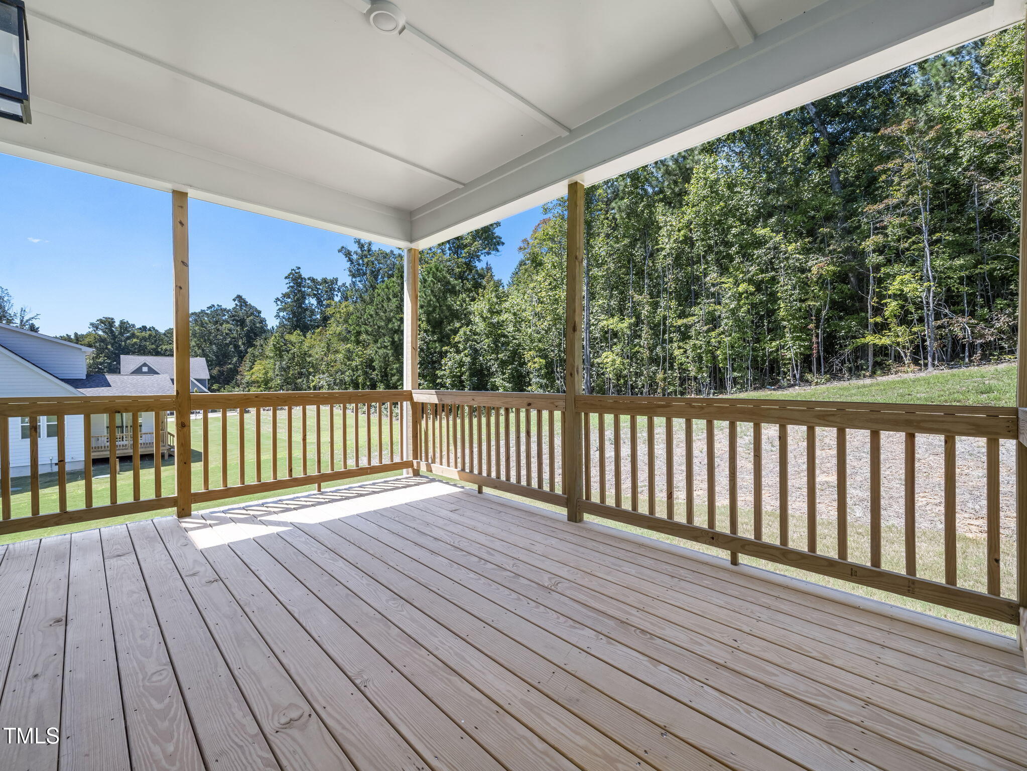 1112 Prominence Drive Durham, NC 27712 - Photo 31 of 40 a view of wooden balcony with outdoor space