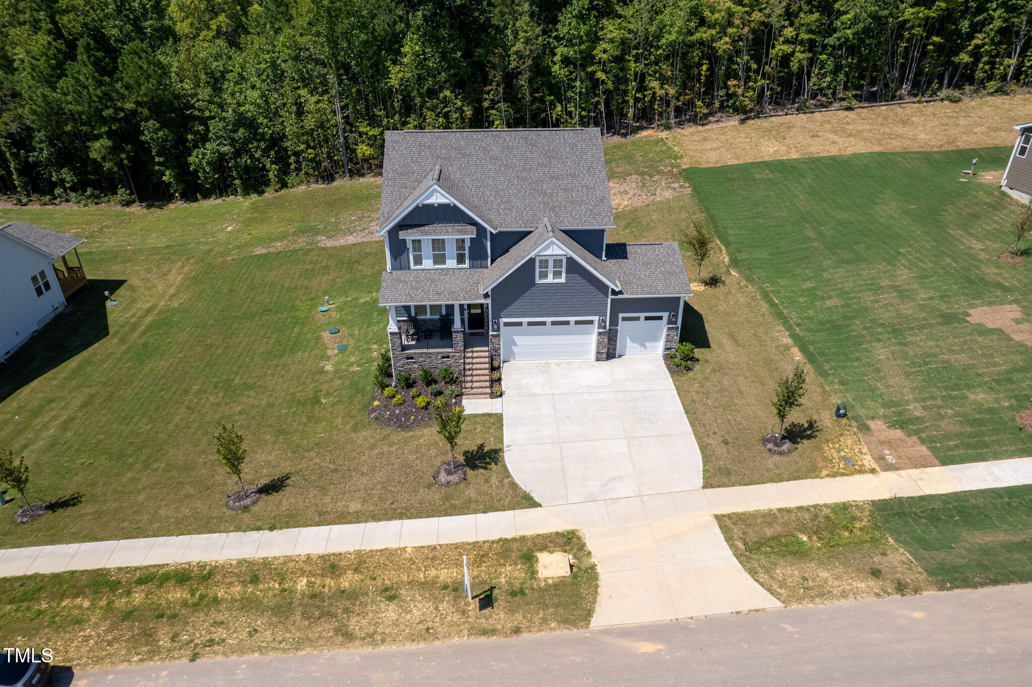 1112 Prominence Drive Durham, NC 27712 - Photo 39 of 40 a view of a house with a yard