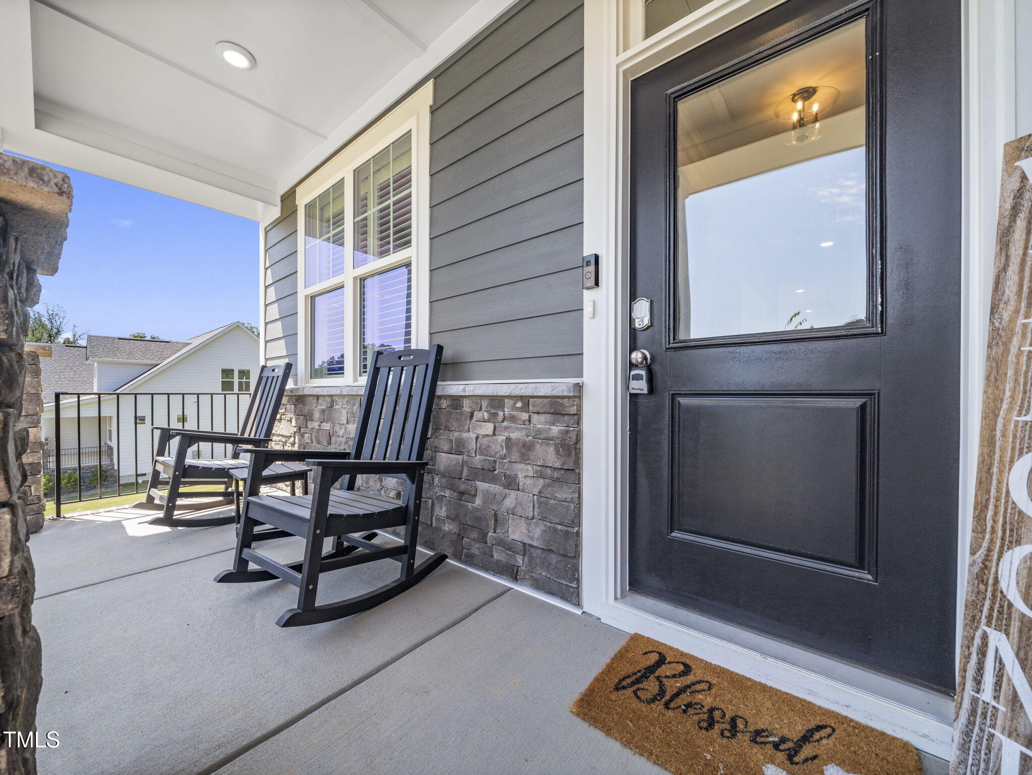 1112 Prominence Drive Durham, NC 27712 - Photo 6 of 40 a view of living room with balcony and furniture