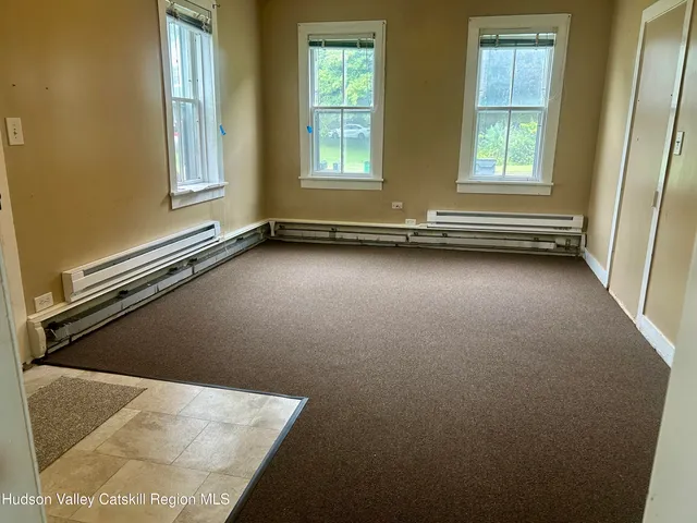 an empty room with a bathroom