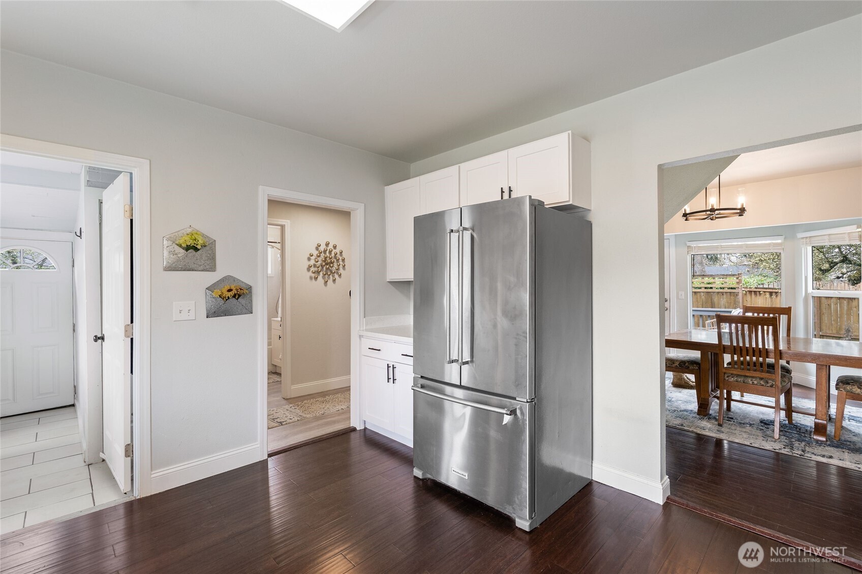 11 R Street Southeast Auburn, WA 98002 - Photo 14 of 38 a view of a kitchen with wooden floor and electronic appliances