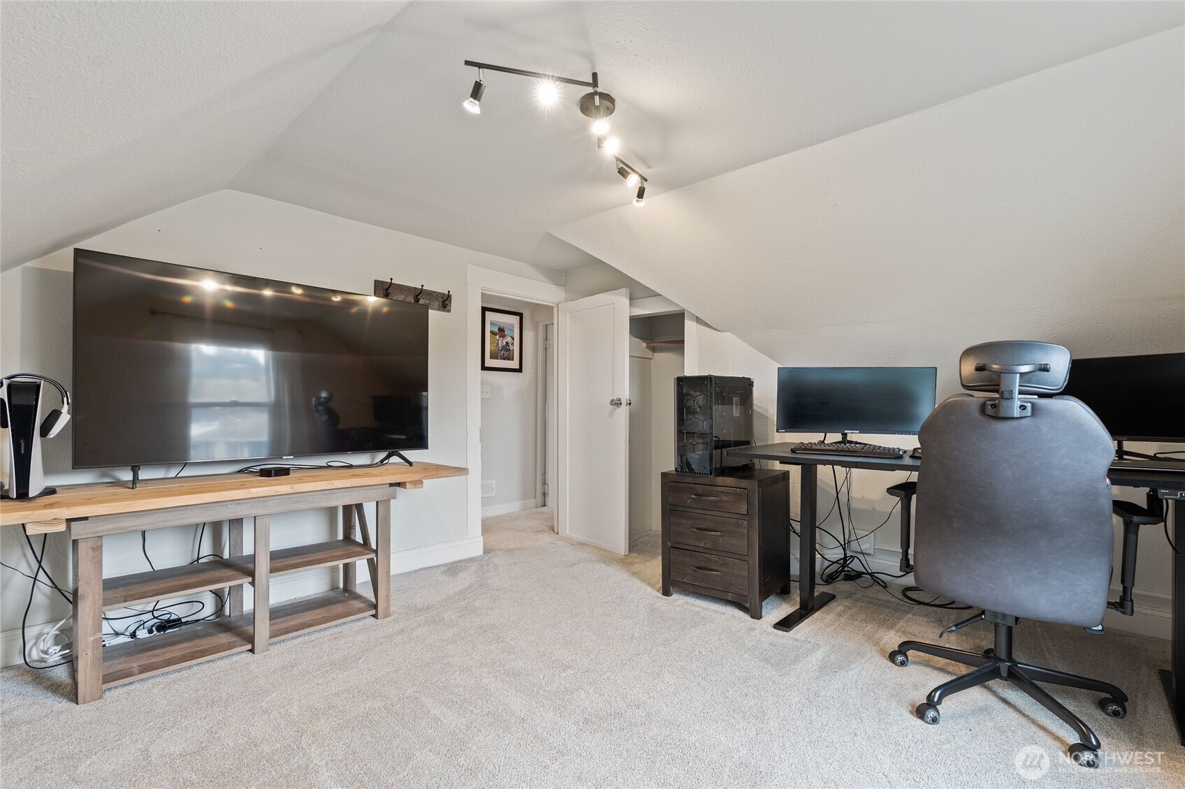 11 R Street Southeast Auburn, WA 98002 - Photo 23 of 38 a view of a livingroom with furniture and a flat screen tv