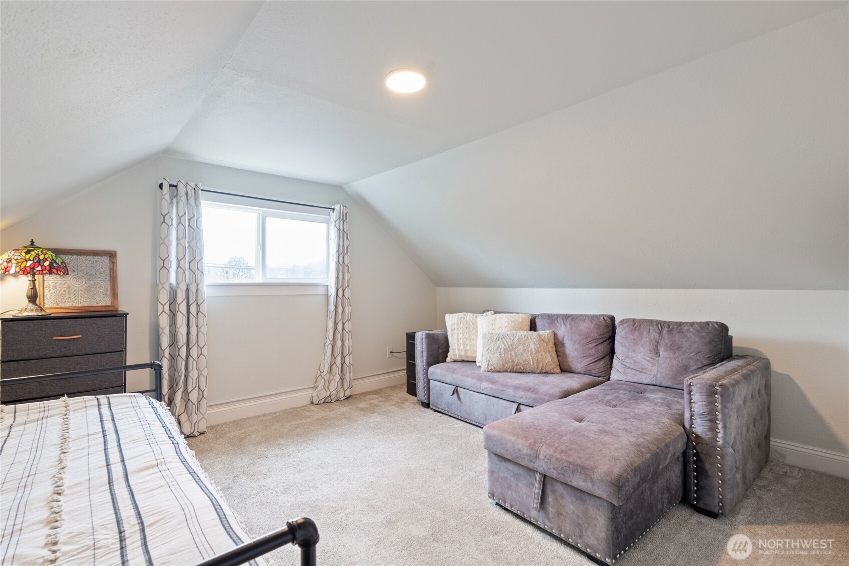11 R Street Southeast Auburn, WA 98002 - Photo 26 of 38 a living room with furniture and a rug