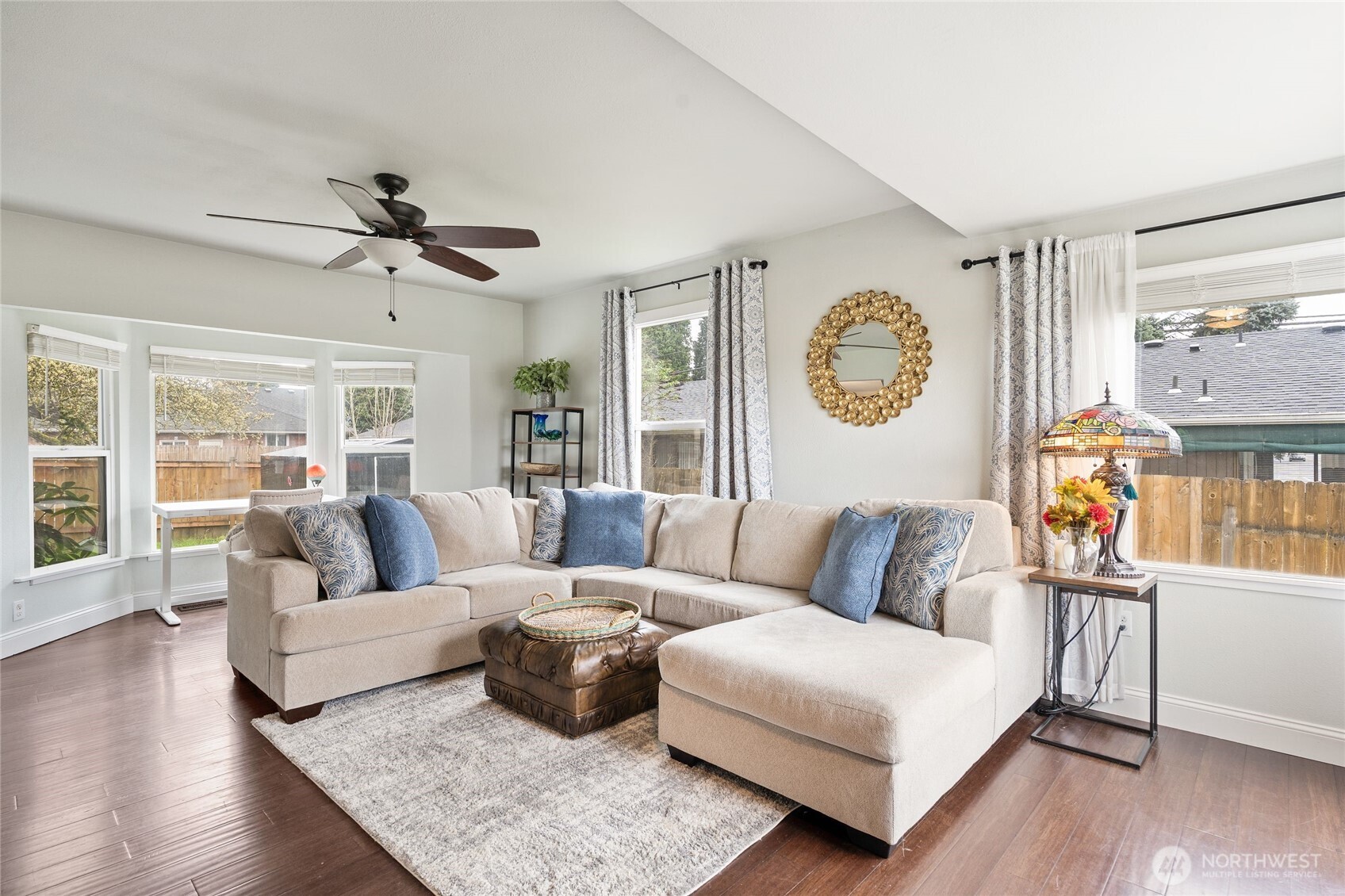 11 R Street Southeast Auburn, WA 98002 - Photo 3 of 38 a living room with furniture and a large window