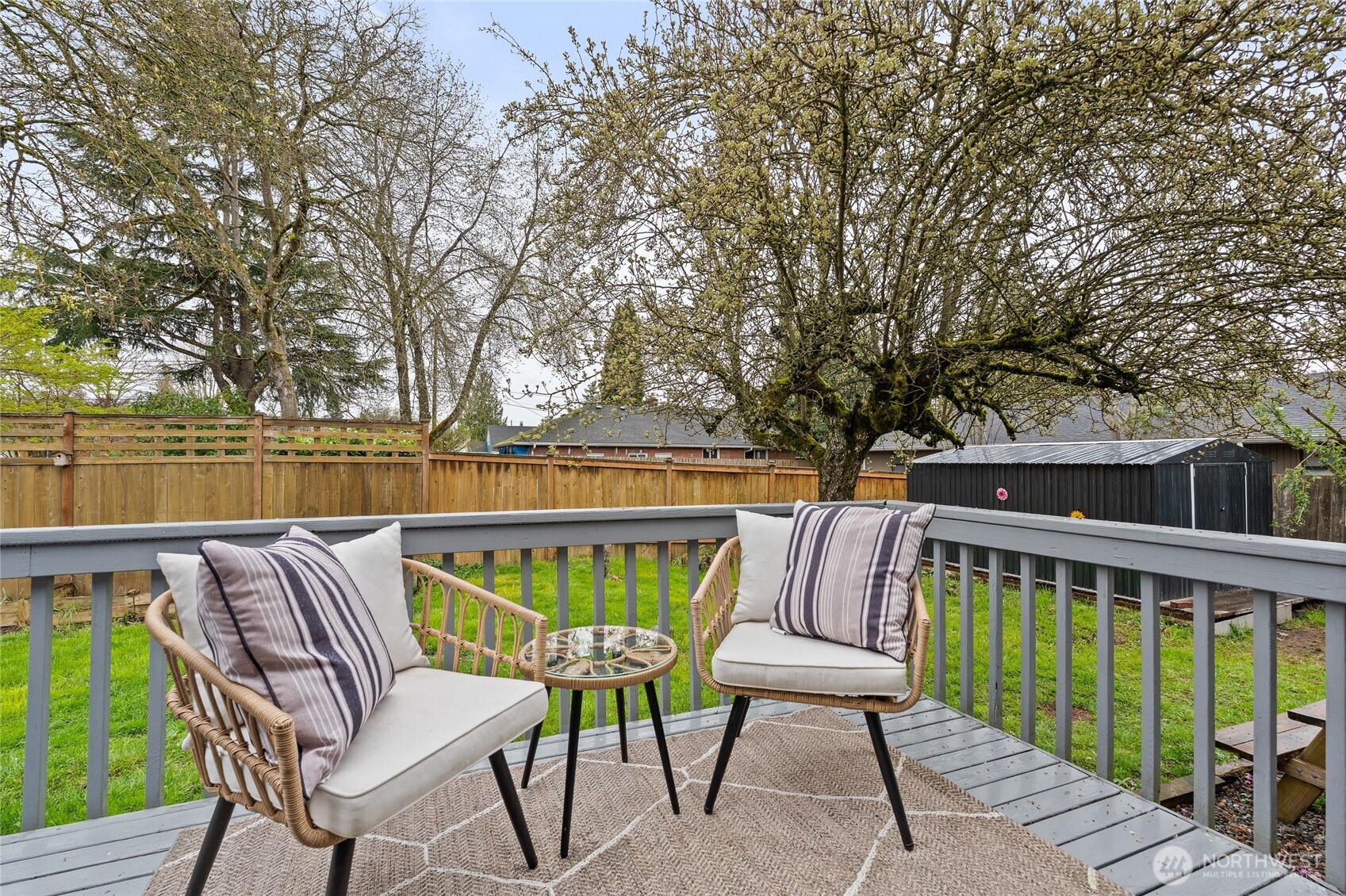 11 R Street Southeast Auburn, WA 98002 - Photo 36 of 38 a roof deck with chairs and wooden fence