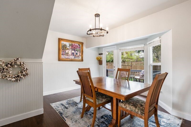 11 R Street Southeast Auburn, WA 98002 - Photo 8 of 38 a view of a dining room with furniture window and wooden floor