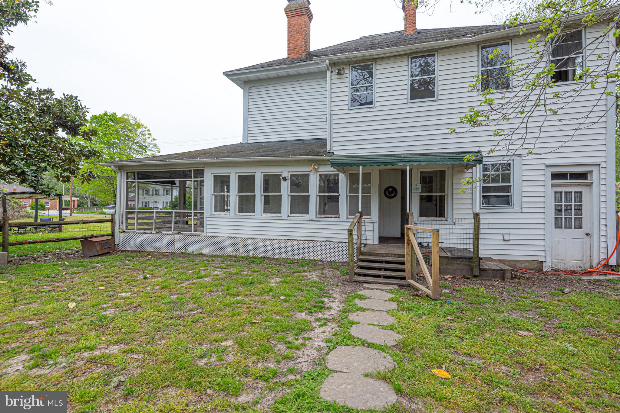 8318 Langmaid Road Newark, MD 21841 - Photo 104 of 122 a front view of a house with a yard