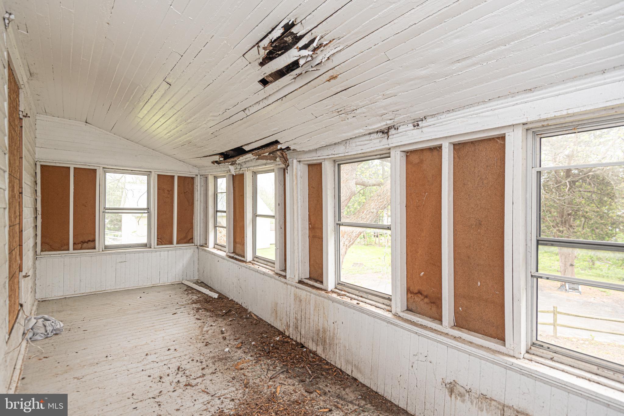 8318 Langmaid Road Newark, MD 21841 - Photo 63 of 122 a view of an empty room with a window