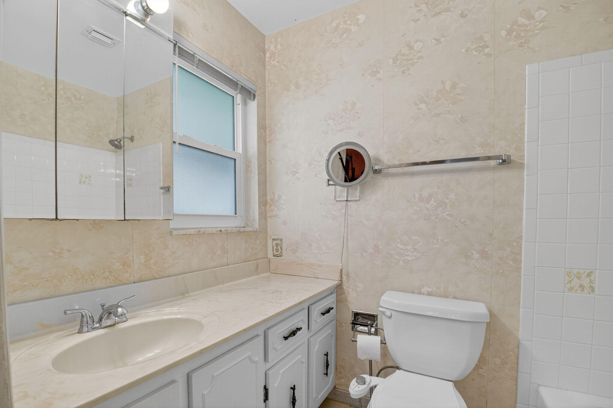 634 Hummingbird Lane Delray Beach, FL 33445 - Photo 20 of 37 a bathroom with a sink toilet and shower
