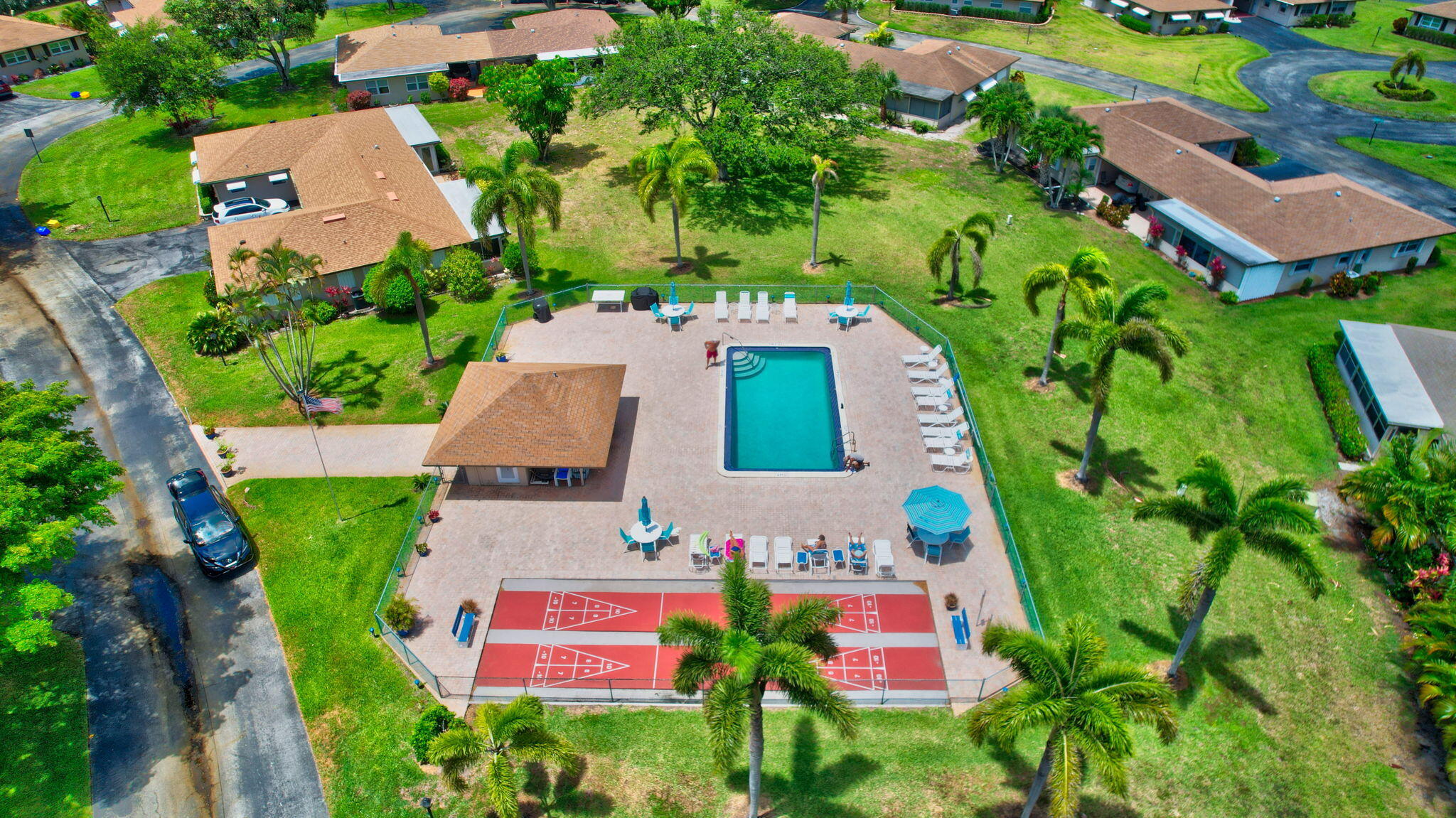 634 Hummingbird Lane Delray Beach, FL 33445 - Photo 31 of 37 an aerial view of house with yard swimming pool and outdoor seating