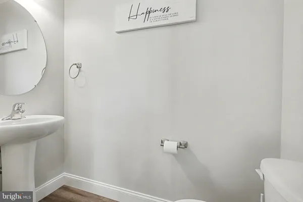 a bathroom with a sink and mirror