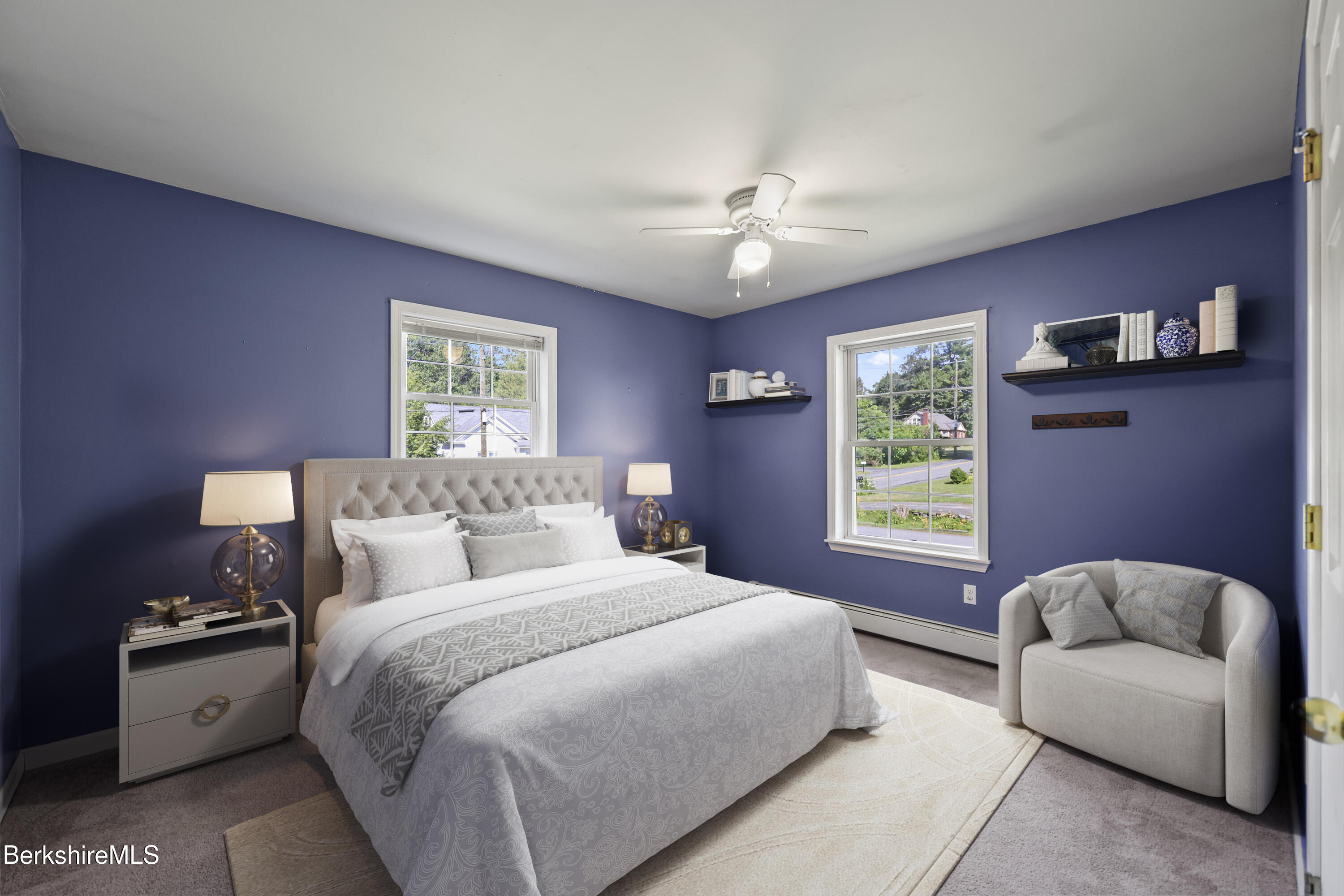 29 Balance Rock Road Lanesborough, MA 01237 - Photo 15 of 38 a bedroom with a large bed and a couch