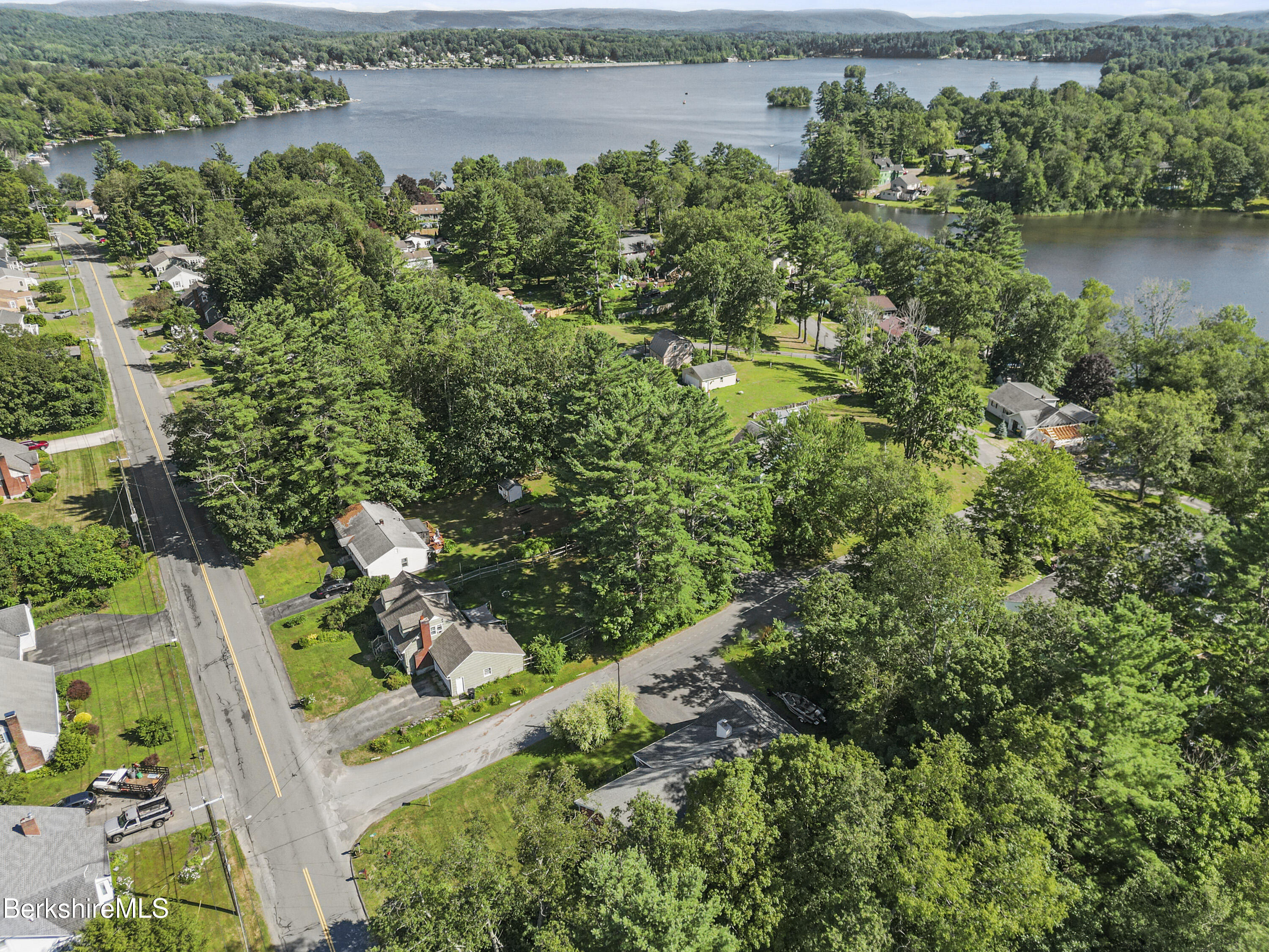 29 Balance Rock Road Lanesborough, MA 01237 - Photo 3 of 38 an aerial view of a house with a yard and outdoor seating