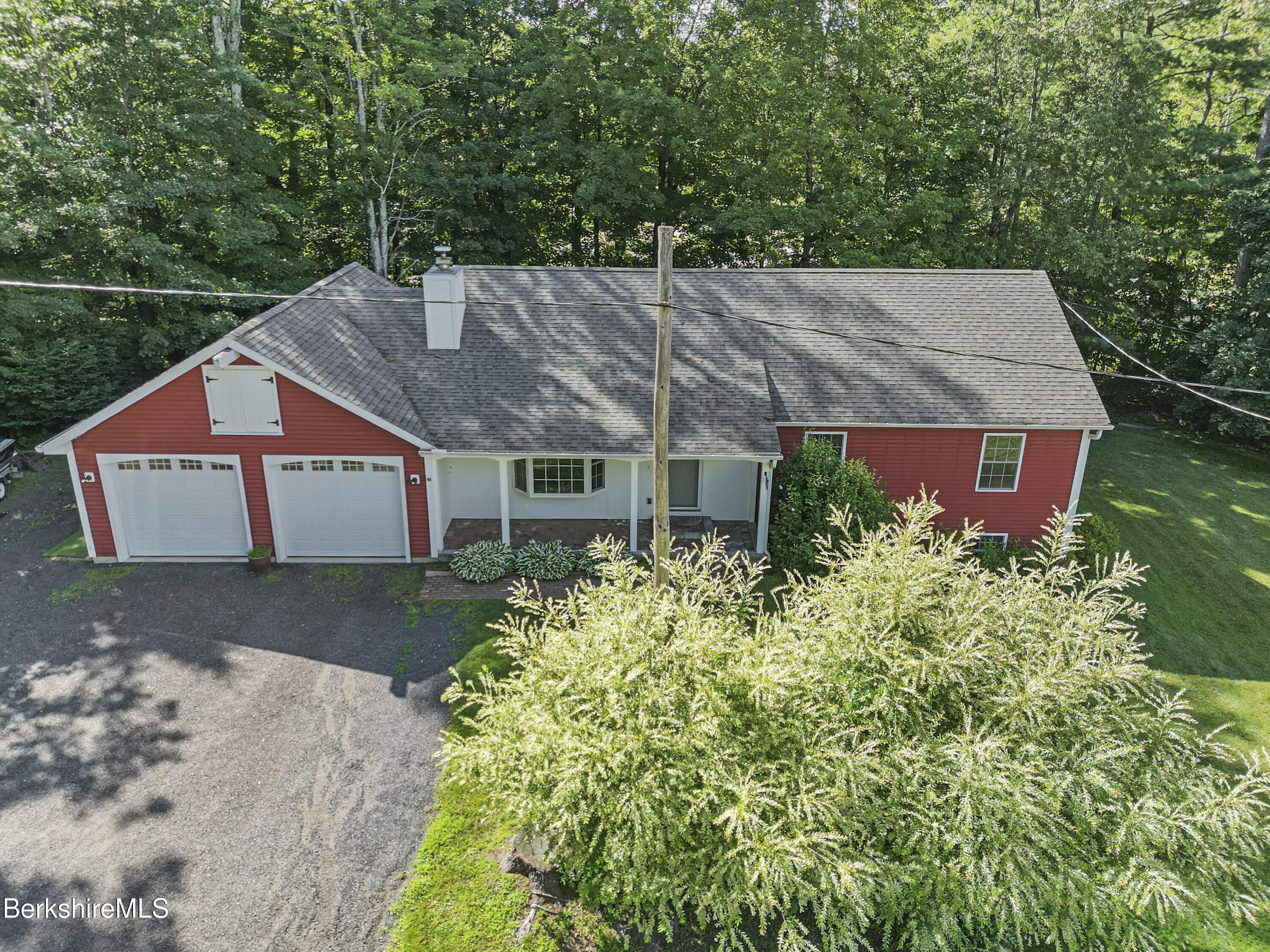 29 Balance Rock Road Lanesborough, MA 01237 - Photo 34 of 38 a aerial view of a house with a yard and large trees