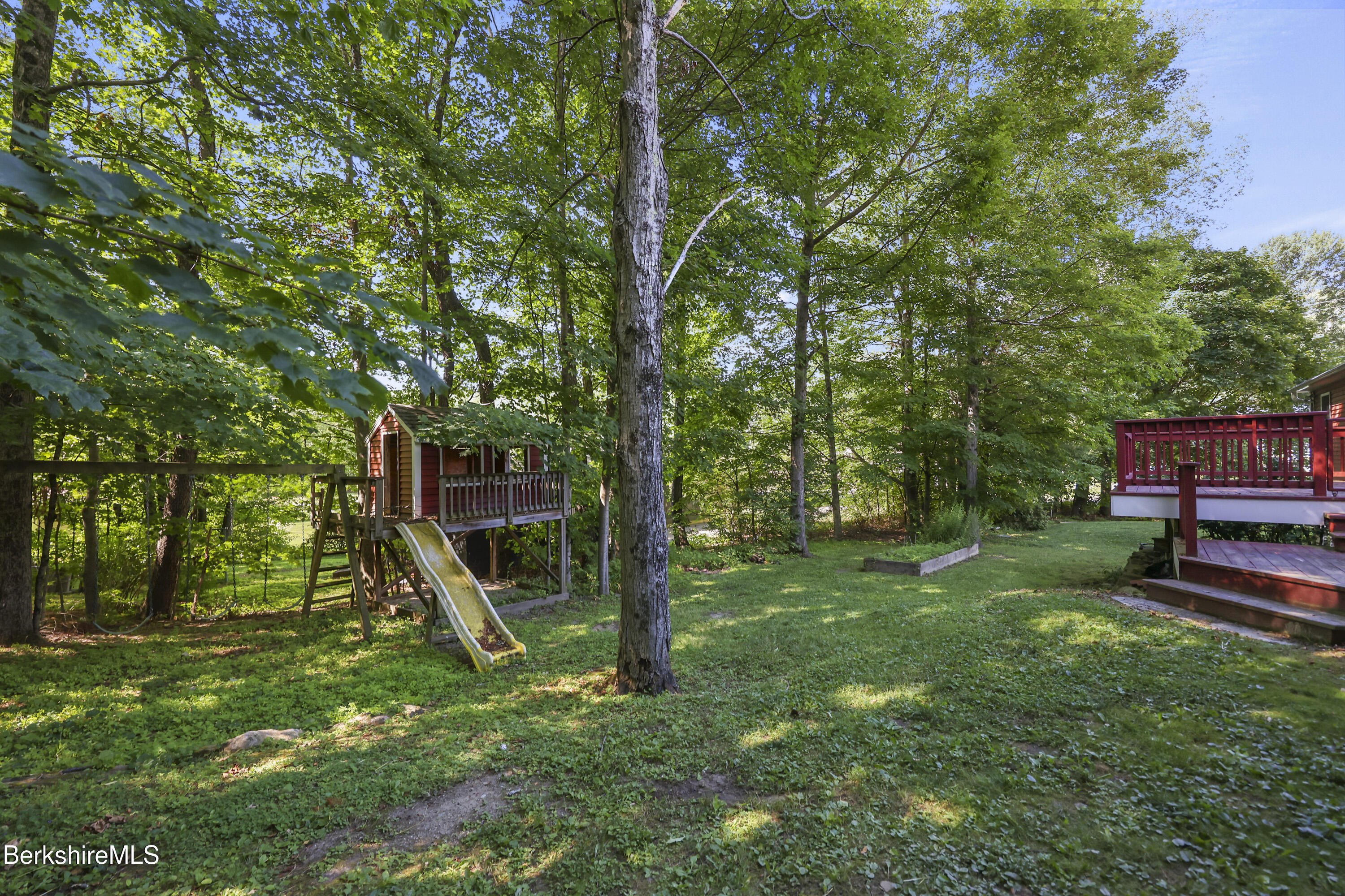 29 Balance Rock Road Lanesborough, MA 01237 - Photo 36 of 38 a view of a garden with a slide