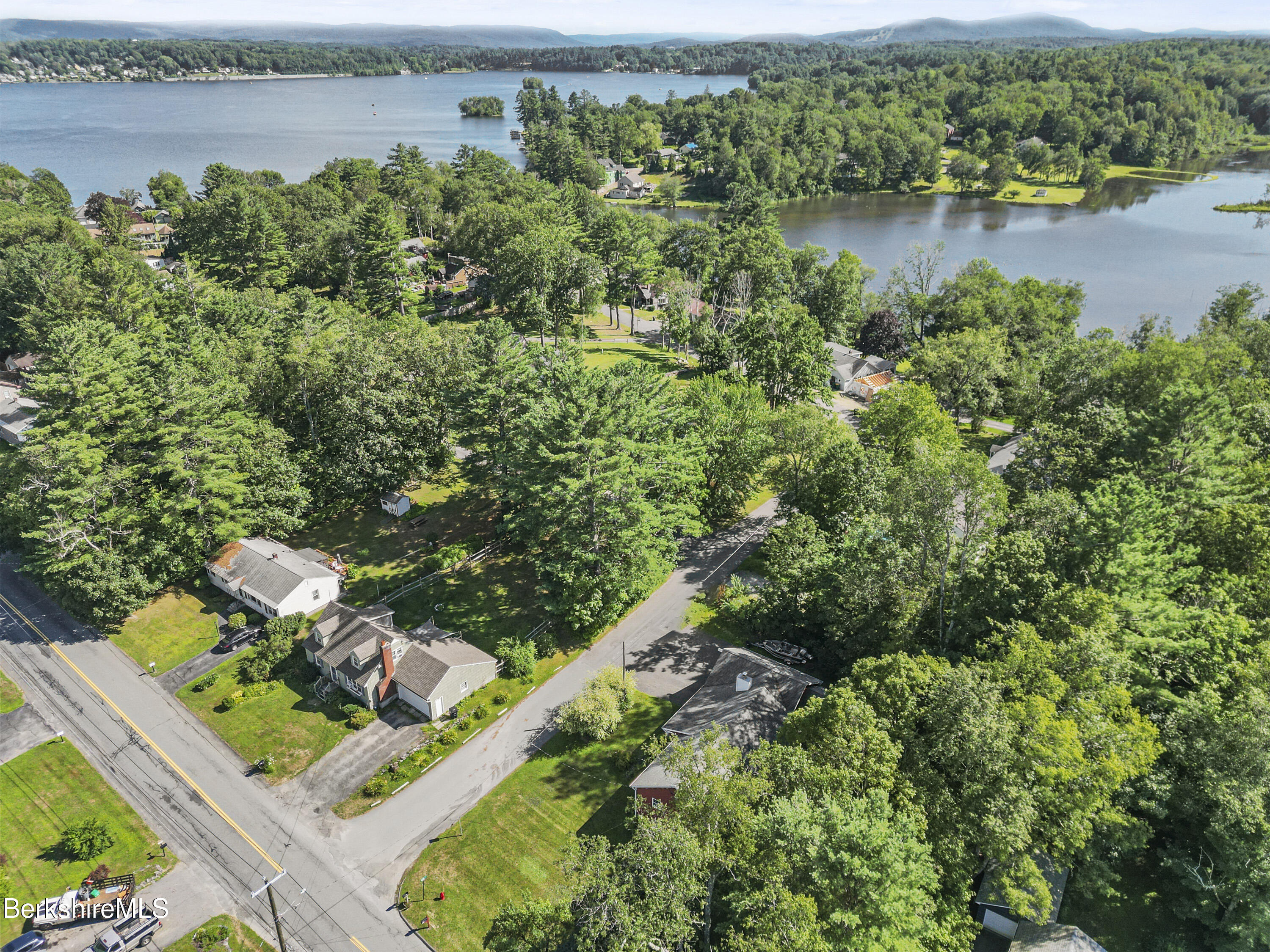 29 Balance Rock Road Lanesborough, MA 01237 - Photo 37 of 38 an aerial view of a house with a yard and lake view