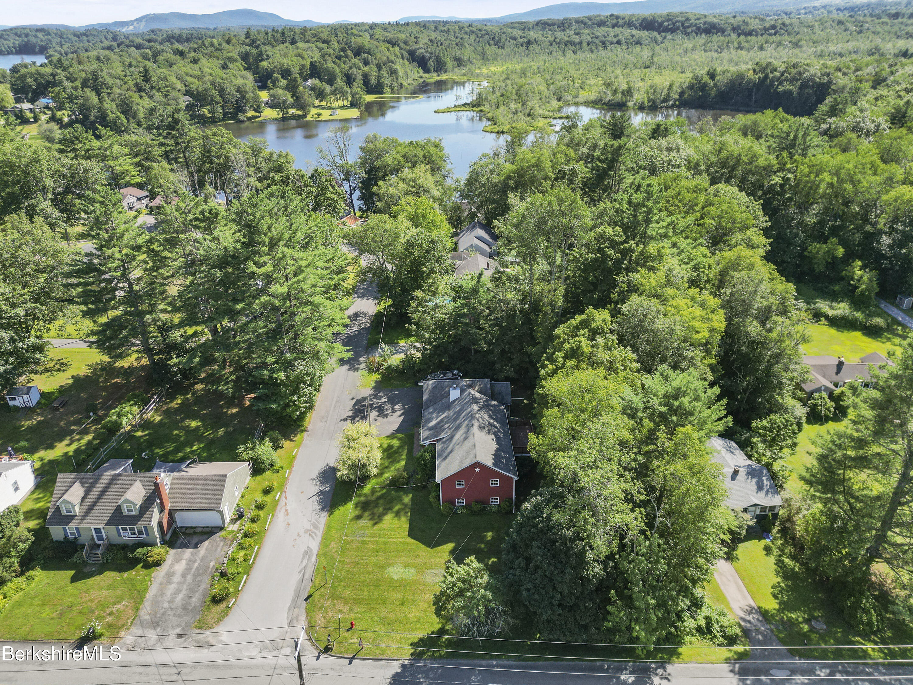 29 Balance Rock Road Lanesborough, MA 01237 - Photo 38 of 38 an aerial view of a house with a yard and lake view