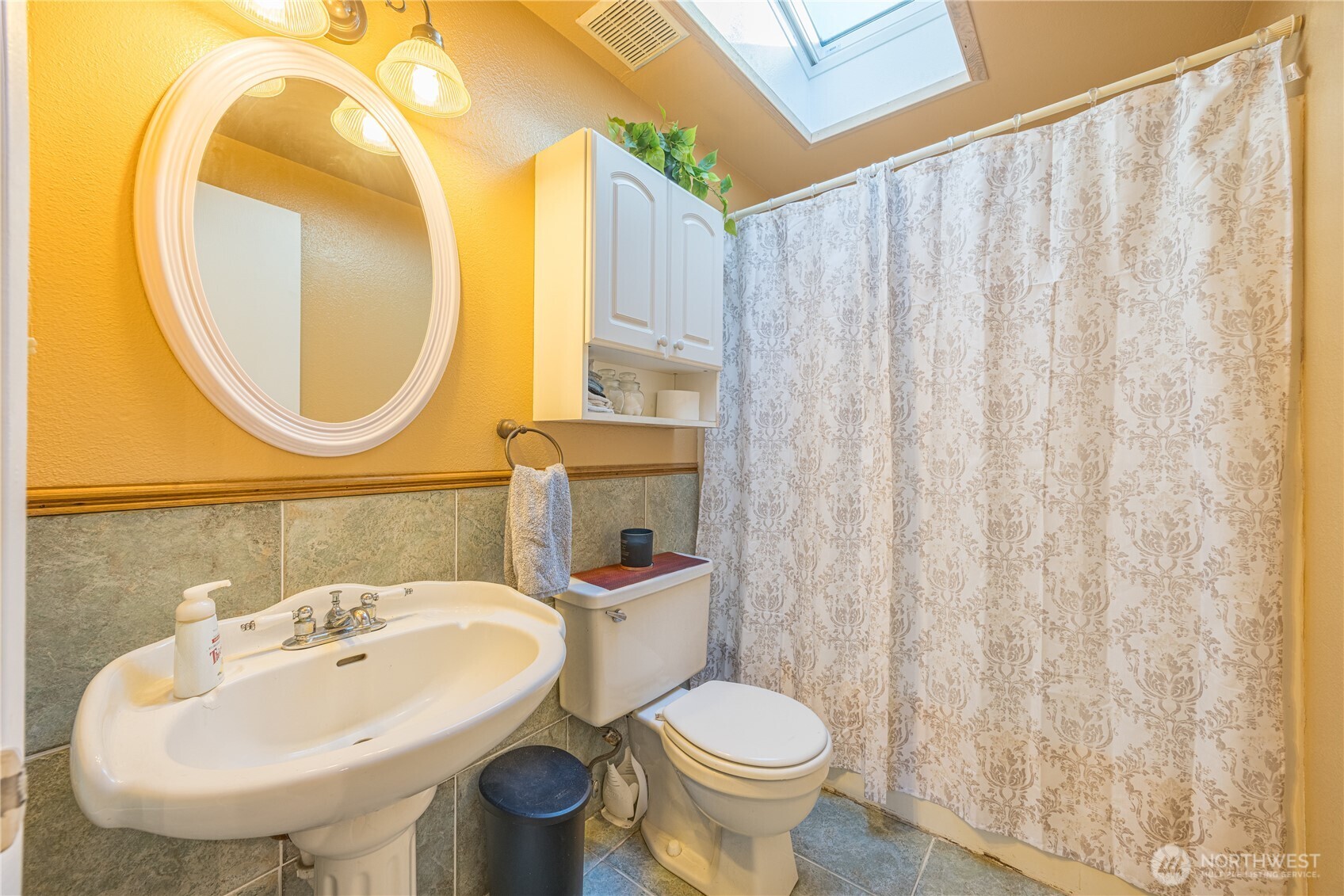 2095 Bear Creek Road Port Angeles, WA 98363 - Photo 17 of 39 a bathroom with a sink and a mirror