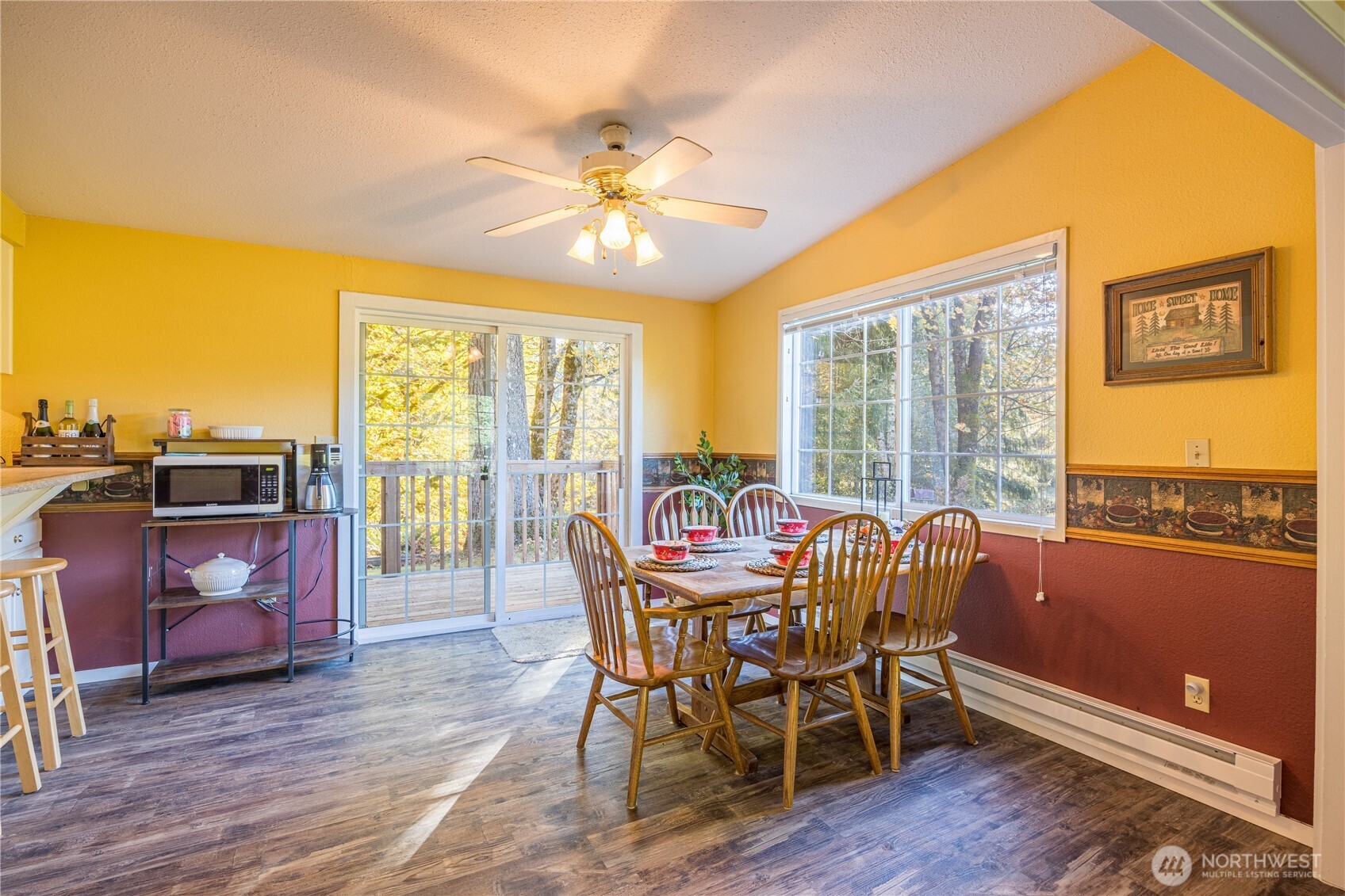 2095 Bear Creek Road Port Angeles, WA 98363 - Photo 7 of 39 a dining room with furniture window and wooden floor