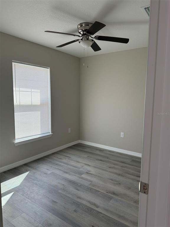 9543 North Travis Drive, Unit B Citrus Springs, FL 34434 - Photo 5 of 11 a view of an empty room with a window