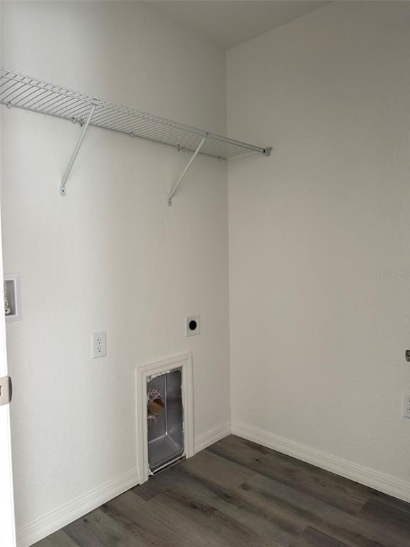 9543 North Travis Drive, Unit B Citrus Springs, FL 34434 - Photo 10 of 11 a view of a room with wooden floor