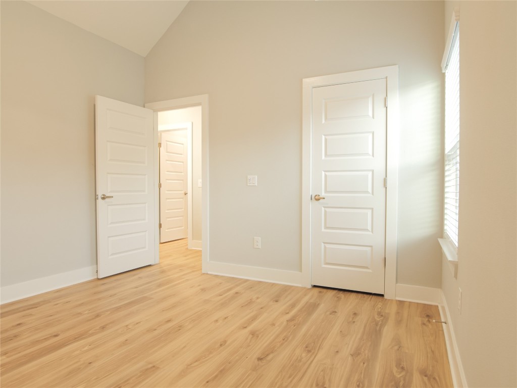6014 Fairway Street, Unit 2 Austin, TX 78741 - Photo 20 of 24 an empty room with wooden door