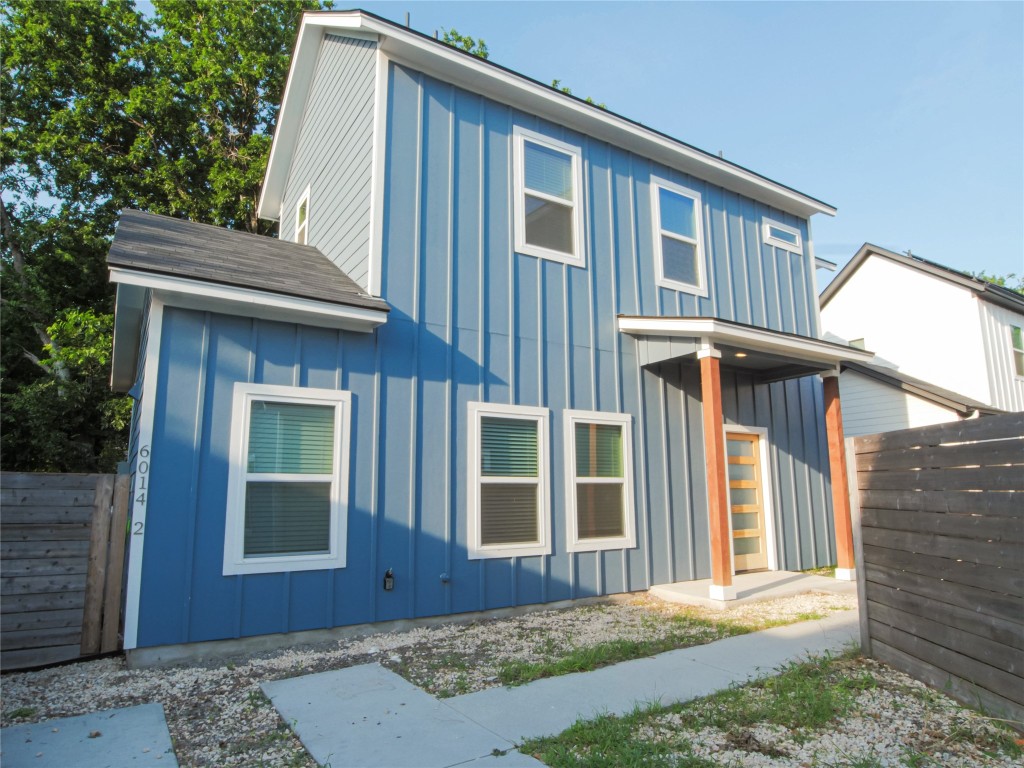 6014 Fairway Street, Unit 2 Austin, TX 78741 - Photo 2 of 24 a front view of a house with a yard