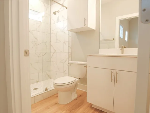 a view of a house with a yard and garage