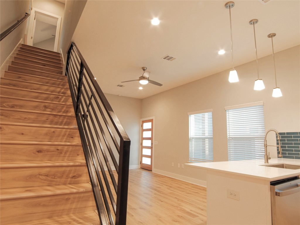 6014 Fairway Street, Unit 2 Austin, TX 78741 - Photo 9 of 24 a view of an empty room with wooden floor and a window