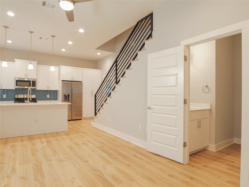 6014 Fairway Street, Unit 2 Austin, TX 78741 - Photo 10 of 24 a view of kitchen with cabinets and wooden floor