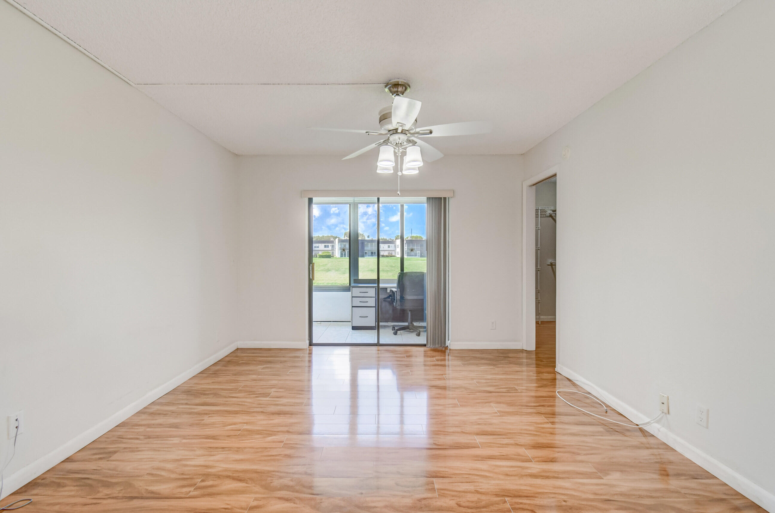 61 Capri B Delray Beach, FL 33484 - Photo 22 of 46 a view of an empty room with window