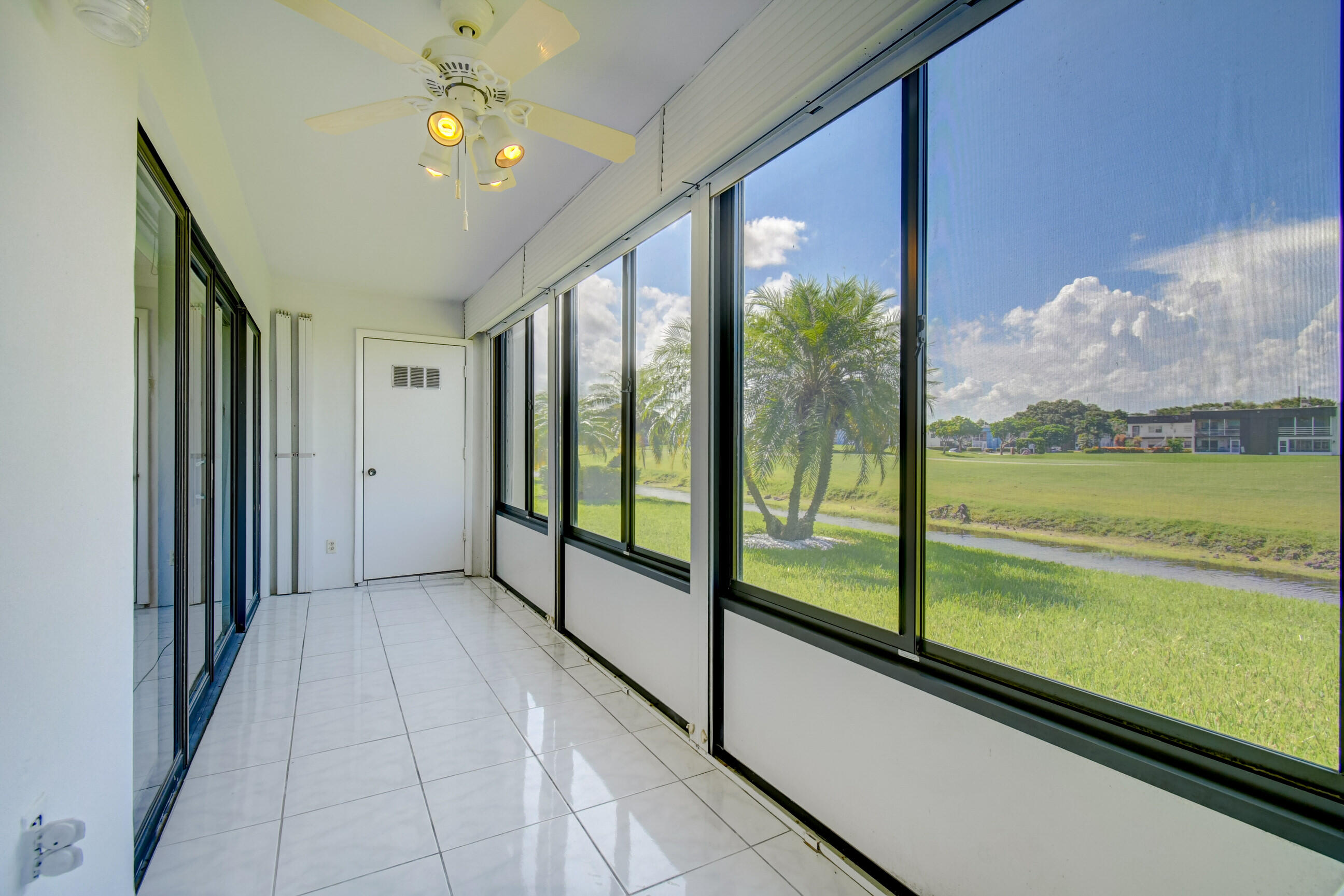 61 Capri B Delray Beach, FL 33484 - Photo 29 of 46 a view of a room with a large window