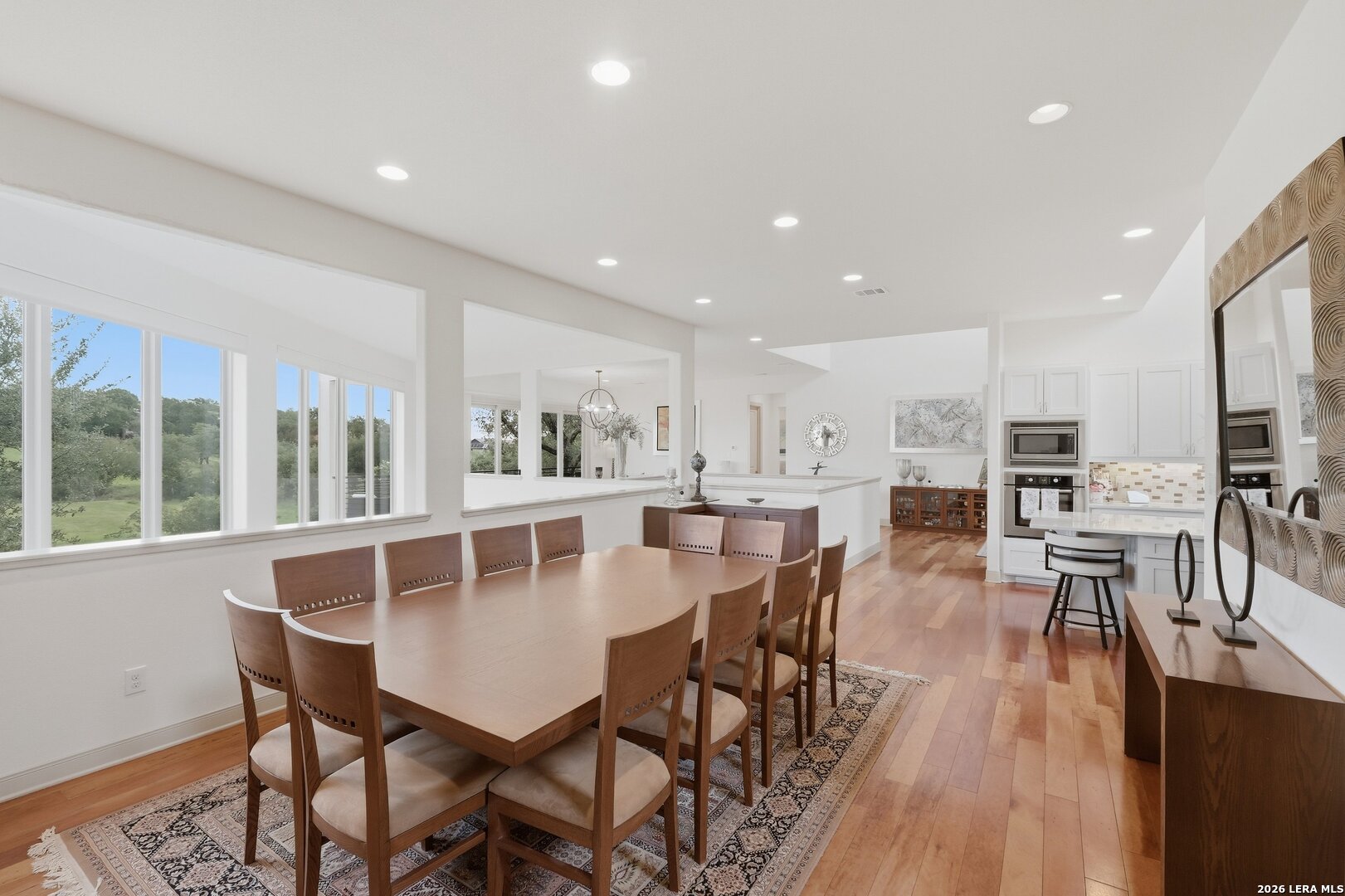 426 Legacy Ridge San Antonio, TX 78258 - Photo 12 of 38 a dining room with furniture and wooden floor